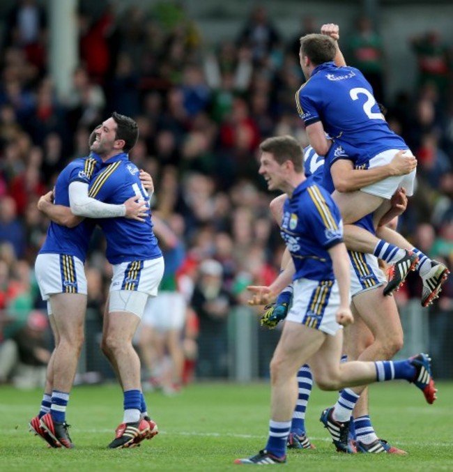 Kerry players celebrate at the final whistle