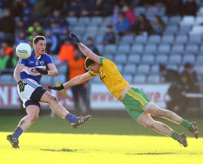 James Finn has his shot blocked by Martin McElhinney