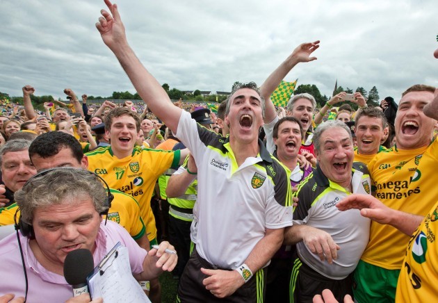 Jim McGuinness celebrates with players