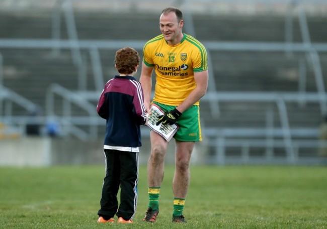 Colm McFadden signs an autograph for a Galway fan after the game