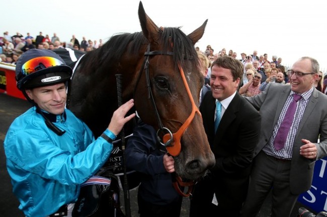 Richard Kingscote celebrates winning with owner Michael Owen