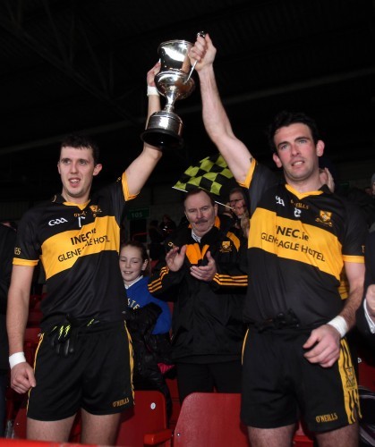 Michael Moloney and Ambrose Donovan lift the cup