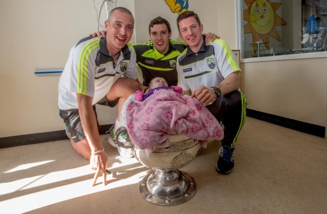 Kieran Donaghy, Anthony Maher and Kieran O'Leary with Ella O'Donoghue