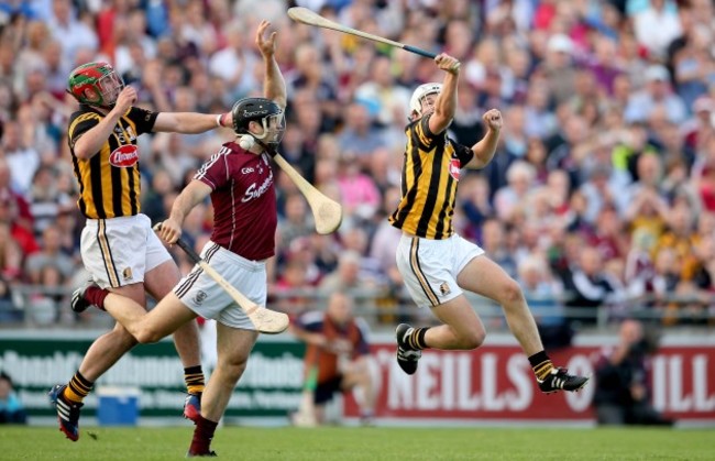 Eoin Larkin and Padraig Walsh with David Collins