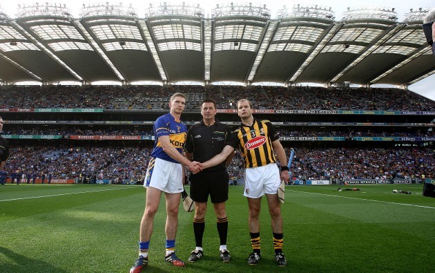 Brian Gavin with captains Brendan Maher and JJ Delaney
