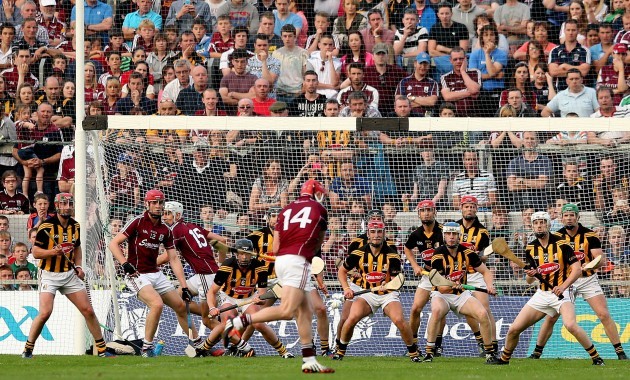 Joe Canning attempts a late free