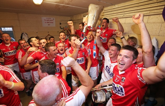 Cork team celebrate with the cup