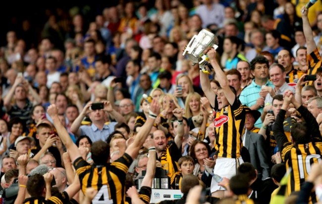 Lester Ryan lifts the Liam McCarthy Cup