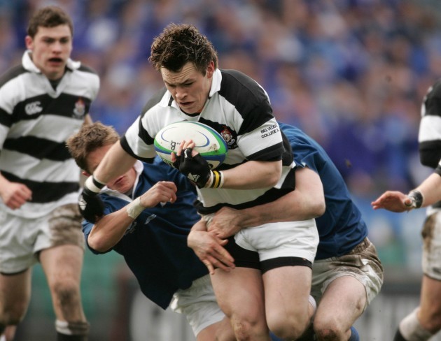 Cian Healy of Belevedere is tackled
