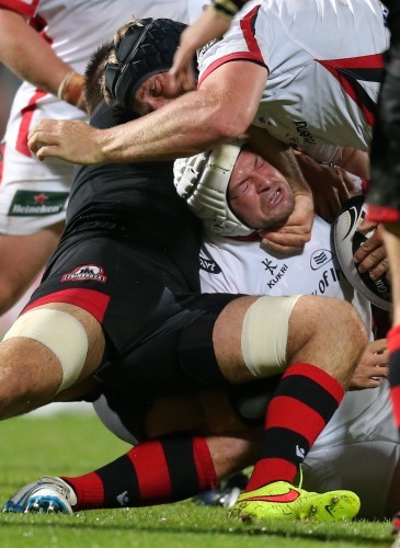 Rory Best is tackled by Cornell Du Preez
