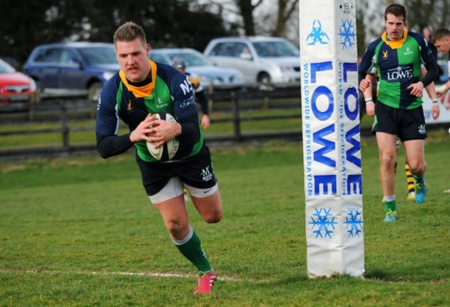 Rodger McBurney scores their first try