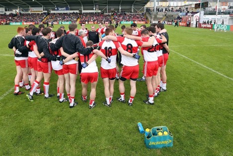Brian McIver addresses the team prior to throw in