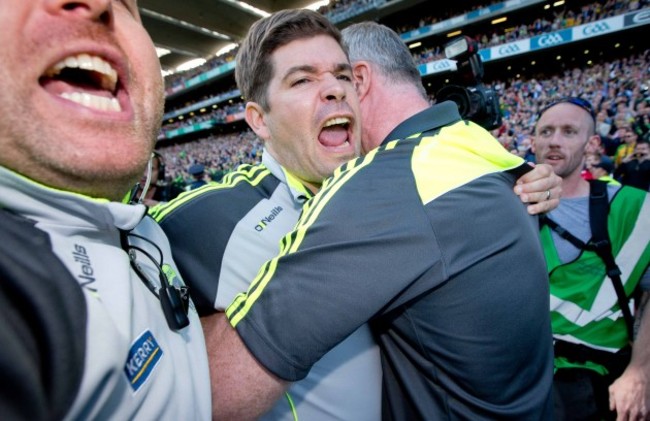 Eamonn Fitzmaurice celebrates with Diarmuid Murphy and Cian O'Neill