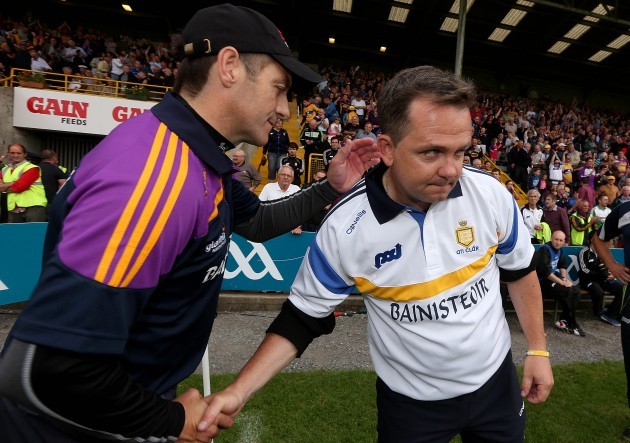 Davy Fitzgerald and Liam Dunne at the end of the game