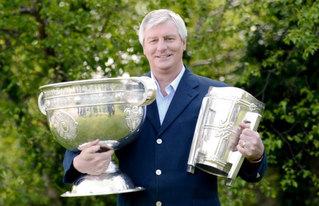 Michael Lyster with the Sam Maguire and the Liam McCarthy Cup