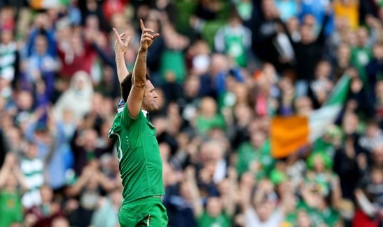 Robbie Keane celebrates scoring his side's second goal