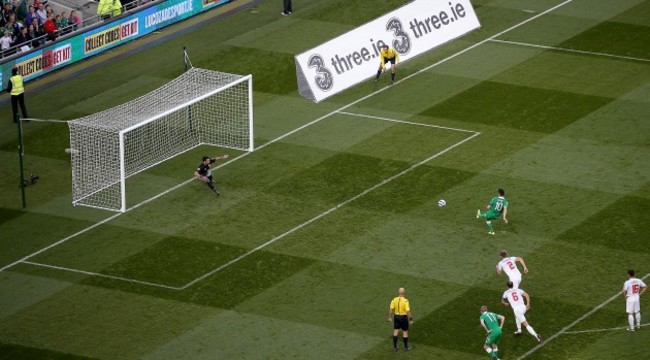 Robbie Keane scores his third goal from the penalty spot