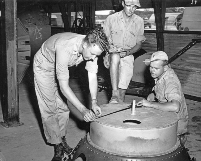 soldiers-check-the-casings-on-the-fat-man-atomic-bomb-multiple-test-bombs-were-created-on-tinian-island-all-were-roughly-identical-to-an-operational-bomb-even-though-they-lacked-the-necessary-equipment-to-deto