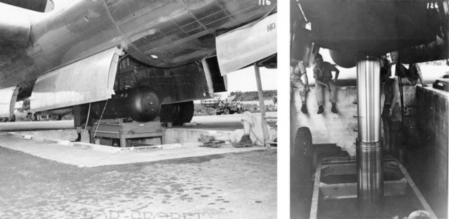 using-the-hydraulic-lift-little-boy-is-carefully-raised-and-loaded-into-the-belly-of-the-enola-gay