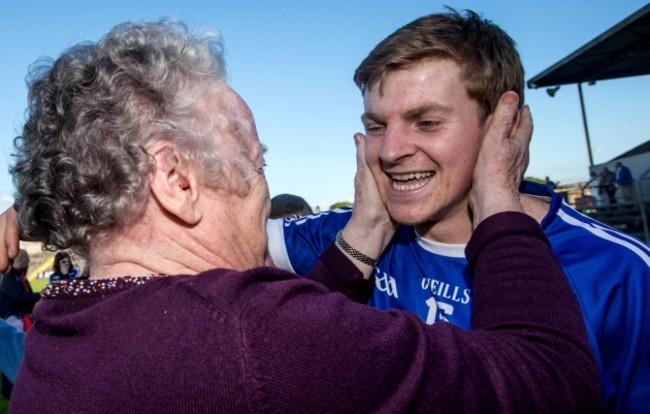 Padraic Collins celebrates with his granny Annette Collins after the game