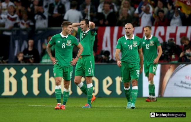 Jeff Hendrick, John O'Shea and Darron Gibson dejected after Germany score