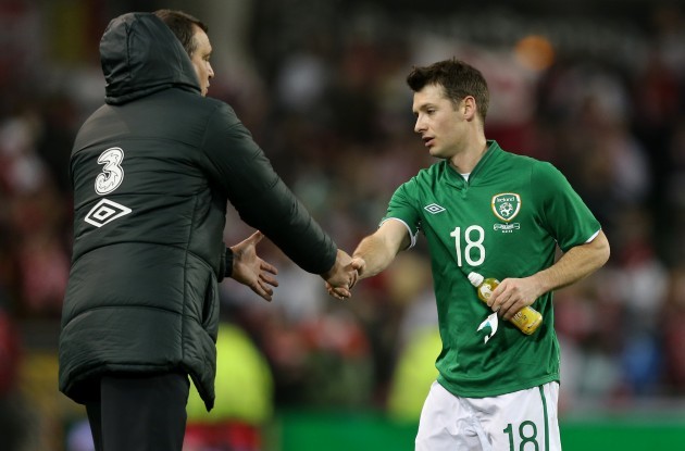 Marco Tardelli shakes hands with Wes Hoolahan after the game