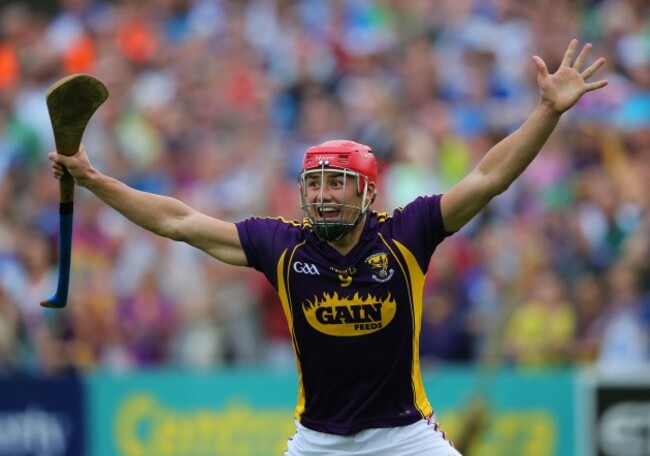 Lee Chin celebrates after the final whistle