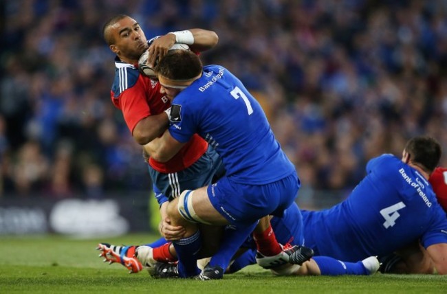 Simon Zebo is tackled by Dominic Ryan
