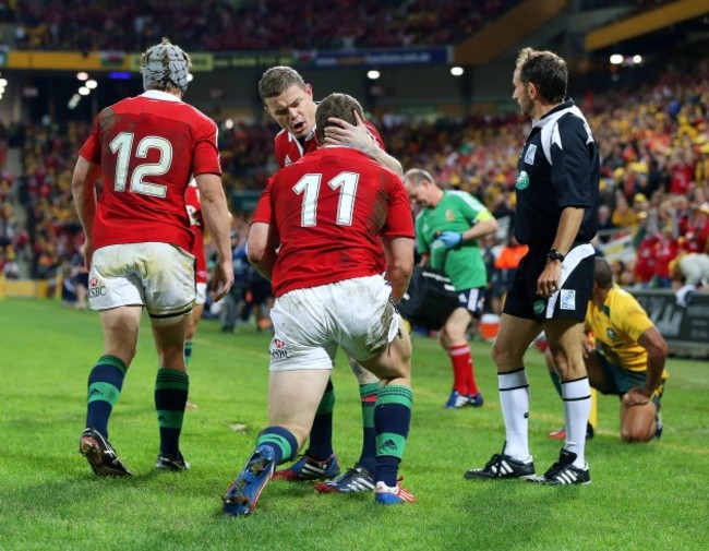 Brian O'Driscoll congratulates George North on scoring a try