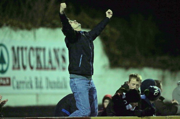 A Dundalk fan celebrates their equalizing penalty score
