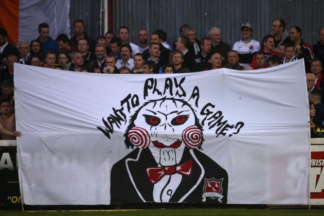 Dundalk supporters display a banner