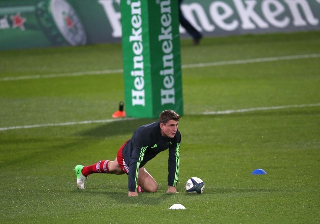 Ian Keatley warms up before the match