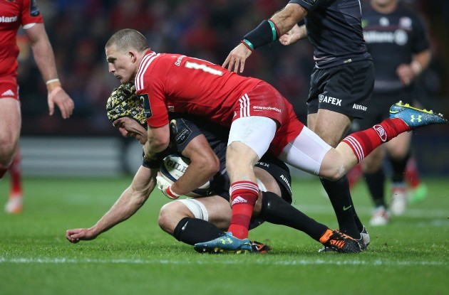 Kelly Brown is tackled by Andrew Conway