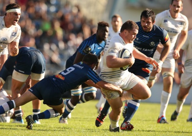 Jack McGrath is tackled by Cedric Garcia