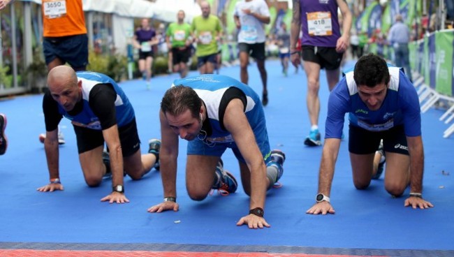 Competitors from Italy cross the finish line