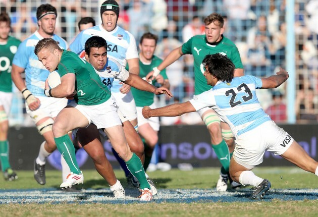 Ian Madigan runs in for a try