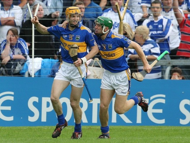 Lar Corbett and Noel McGrath celebrate