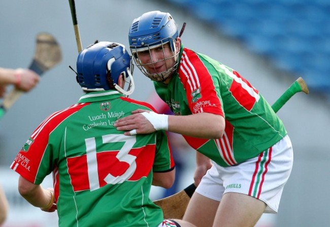 Liam McGrath is congratulated by Cian Hennessy after scoring