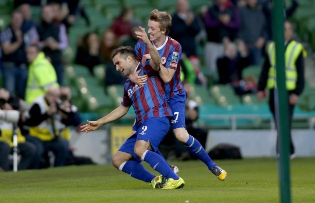 Christy Fagan celebrates scoring the first goal of the game with Chris Forrester