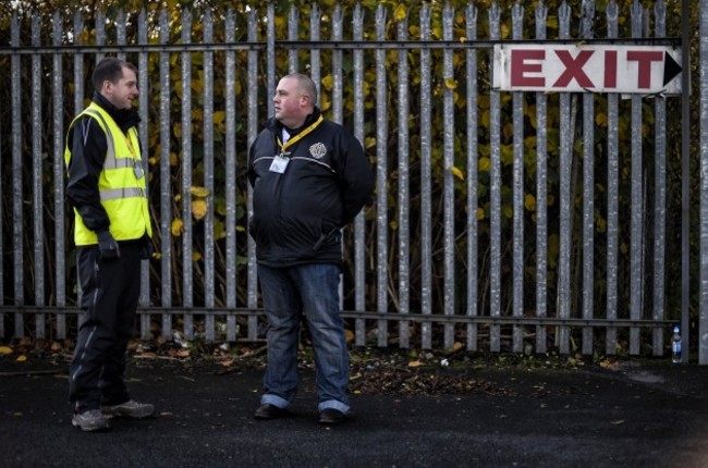 Stewards wait for the game to start