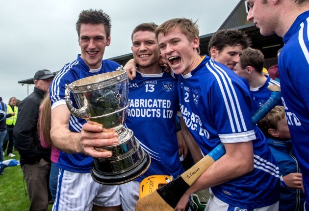 Conor Ryan, Cathal McInerney and David Collins celebrate