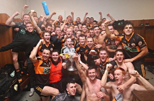 Austin Stacks players celebrate with the cup