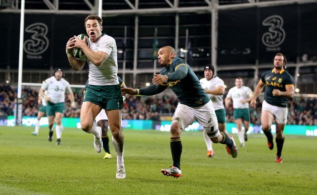 Tommy Bowe scores their second try despite Bryan Habana