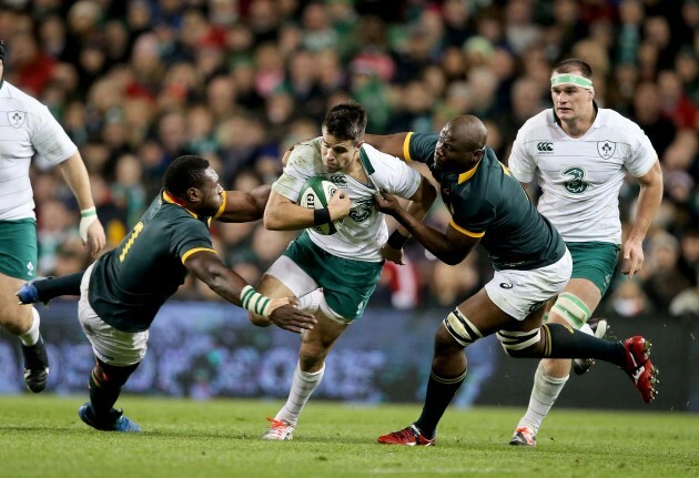 Conor Murray tackled by Tendai Mtawarira and Tebo Mohoje