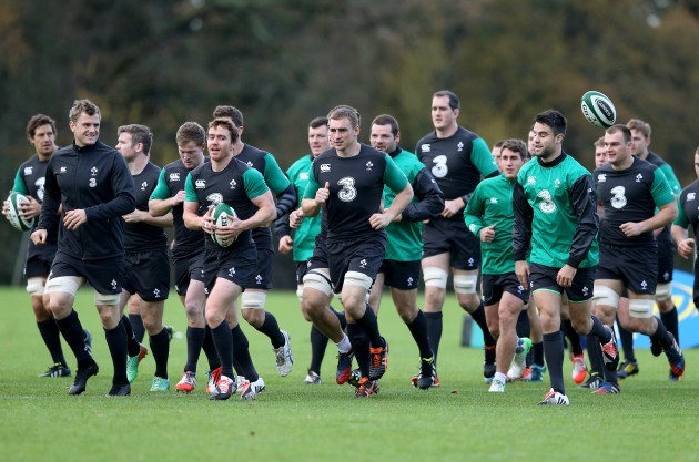 Jamie Heaslip, Eoin Reddan and Tommy O'Donnell leading the Ireland players during training today 12/11/2014