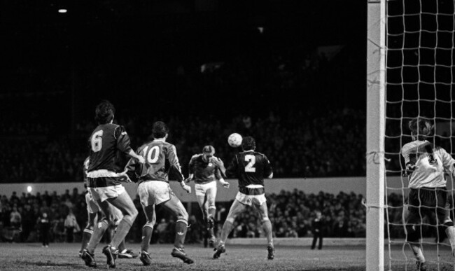 John Byrne heads towards goal