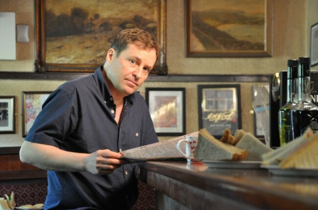 Ardal-w-newspaper