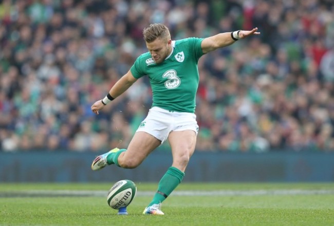 Ian Madigan kicks a penalty