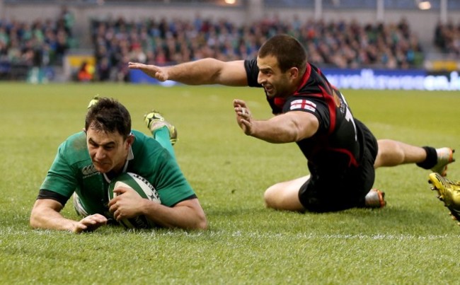 Felix Jones scores a try despite David Kacharava