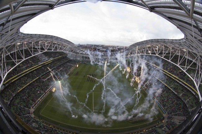 General view of a fireworks display as the teams run on